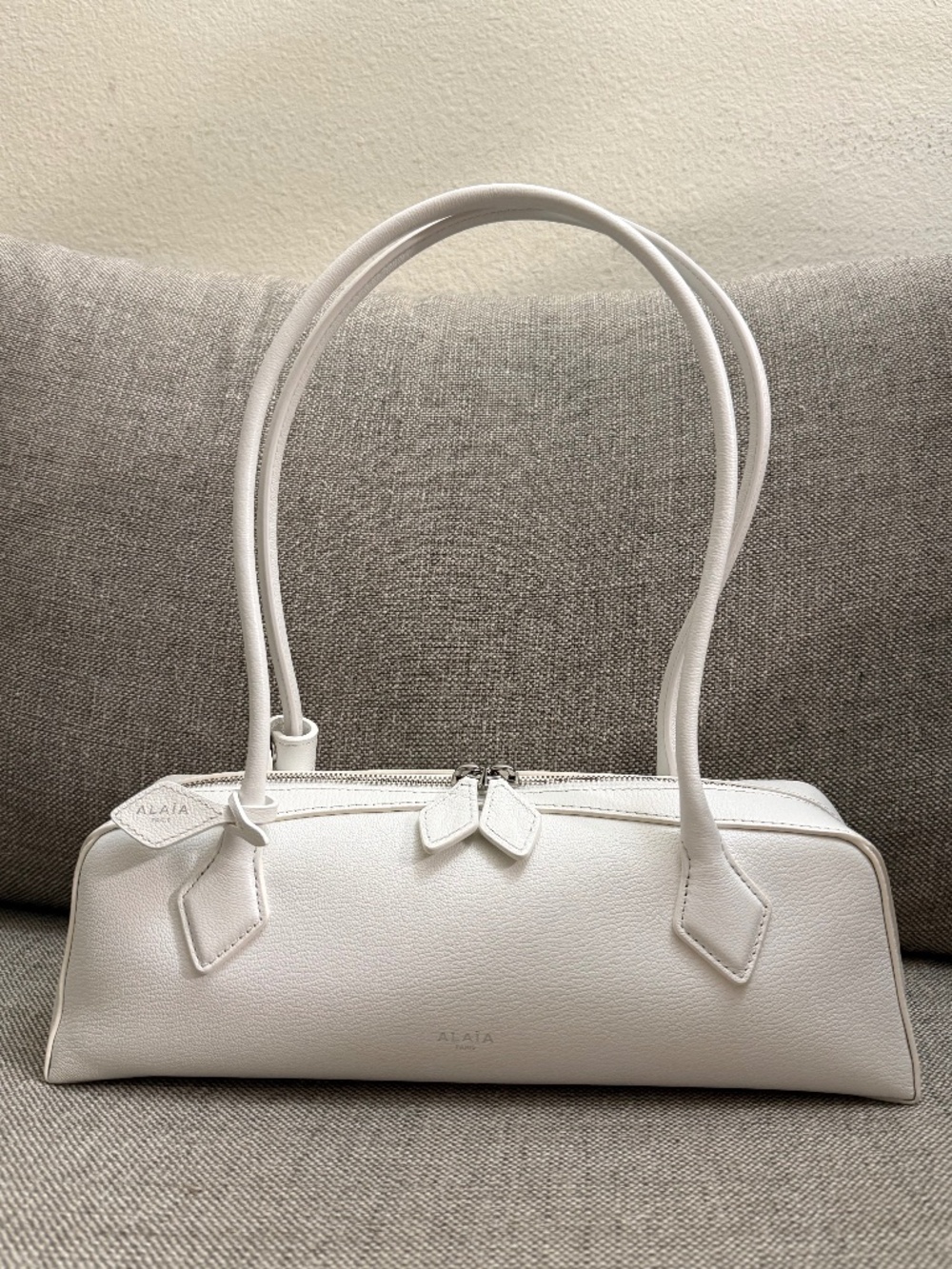 ALAIA LE TECKEL MEDIUM BAG IN GOATSKIN IVORY